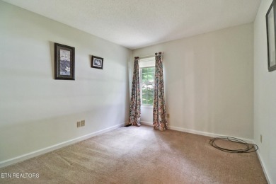 Nestled in a peaceful neighborhood within walking distance to on Druid Hills Golf Club in Tennessee - for sale on GolfHomes.com, golf home, golf lot