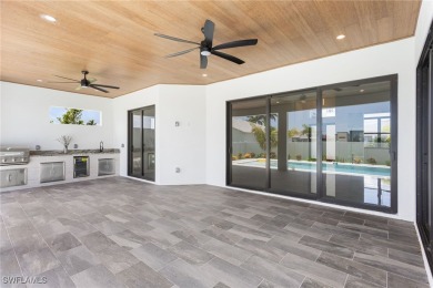 Experience REFINED LIVING in this MODERN LUXURY RESIDENCE in on Palmetto-Pine Country Club in Florida - for sale on GolfHomes.com, golf home, golf lot