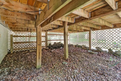 Nestled in a peaceful neighborhood within walking distance to on Druid Hills Golf Club in Tennessee - for sale on GolfHomes.com, golf home, golf lot