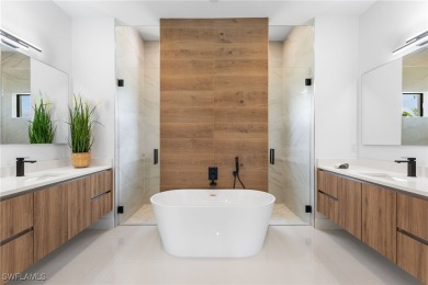 Experience REFINED LIVING in this MODERN LUXURY RESIDENCE in on Palmetto-Pine Country Club in Florida - for sale on GolfHomes.com, golf home, golf lot