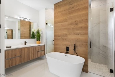 Experience REFINED LIVING in this MODERN LUXURY RESIDENCE in on Palmetto-Pine Country Club in Florida - for sale on GolfHomes.com, golf home, golf lot