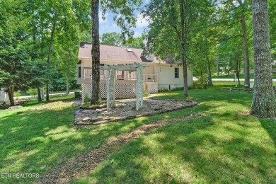 Nestled in a peaceful neighborhood within walking distance to on Druid Hills Golf Club in Tennessee - for sale on GolfHomes.com, golf home, golf lot