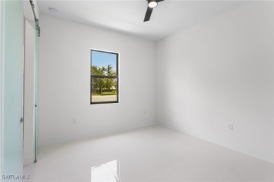 Experience REFINED LIVING in this MODERN LUXURY RESIDENCE in on Palmetto-Pine Country Club in Florida - for sale on GolfHomes.com, golf home, golf lot