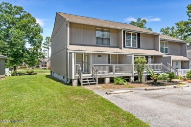 Welcome to this stunning 2-bedroom, 2.5-bathroom townhouse on Diamondhead Country Club in Mississippi - for sale on GolfHomes.com, golf home, golf lot