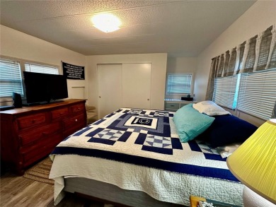 The key word with this home is NEW! New upgraded luxury vinyl on Fairway Village Golf Course in Florida - for sale on GolfHomes.com, golf home, golf lot
