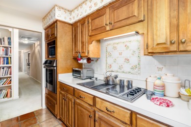 Charming 3-bedroom, 2.5-bath home on a corner lot overlooking on Balboa Golf Course in Arkansas - for sale on GolfHomes.com, golf home, golf lot