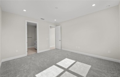 Welcome to this beautifully appointed Highgate floorplan on River Hall Country Club in Florida - for sale on GolfHomes.com, golf home, golf lot