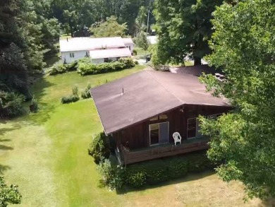 Nestled in the heart of serene surroundings of Oakland Beach on Oakland Beach Golf Course in Pennsylvania - for sale on GolfHomes.com, golf home, golf lot