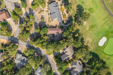 Charming 3-bedroom, 2.5-bath home on a corner lot overlooking on Balboa Golf Course in Arkansas - for sale on GolfHomes.com, golf home, golf lot