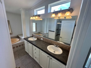Lot Rent $1173.00 monthly    WOW!!!  The only 4 bedrooms, 3 on Del Tura Golf and Country Club in Florida - for sale on GolfHomes.com, golf home, golf lot