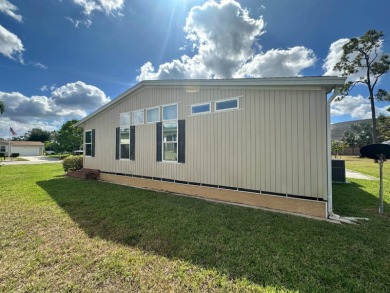 Lot Rent $1173.00 monthly    WOW!!!  The only 4 bedrooms, 3 on Del Tura Golf and Country Club in Florida - for sale on GolfHomes.com, golf home, golf lot