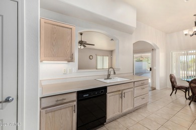 Live on the 18th green of Coyote Lakes in this bright, inviting on Coyote Lakes Golf Club in Arizona - for sale on GolfHomes.com, golf home, golf lot