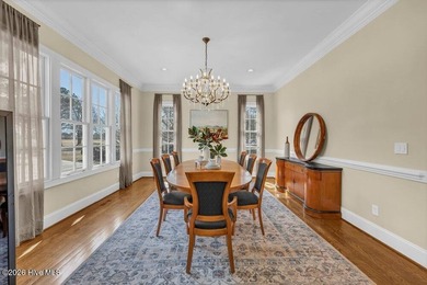 Perfectly situated on the Nicklaus #9 green with tranquil pond on Country Club of Landfall in North Carolina - for sale on GolfHomes.com, golf home, golf lot