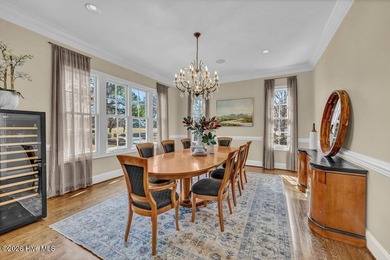 Perfectly situated on the Nicklaus #9 green with tranquil pond on Country Club of Landfall in North Carolina - for sale on GolfHomes.com, golf home, golf lot