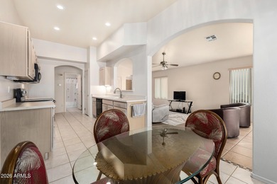 Live on the 18th green of Coyote Lakes in this bright, inviting on Coyote Lakes Golf Club in Arizona - for sale on GolfHomes.com, golf home, golf lot