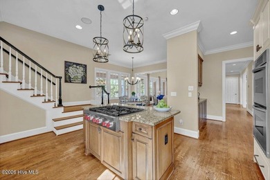 Perfectly situated on the Nicklaus #9 green with tranquil pond on Country Club of Landfall in North Carolina - for sale on GolfHomes.com, golf home, golf lot