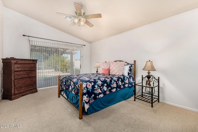 Live on the 18th green of Coyote Lakes in this bright, inviting on Coyote Lakes Golf Club in Arizona - for sale on GolfHomes.com, golf home, golf lot