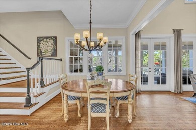 Perfectly situated on the Nicklaus #9 green with tranquil pond on Country Club of Landfall in North Carolina - for sale on GolfHomes.com, golf home, golf lot