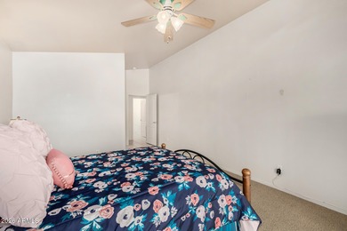 Live on the 18th green of Coyote Lakes in this bright, inviting on Coyote Lakes Golf Club in Arizona - for sale on GolfHomes.com, golf home, golf lot