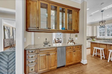 Perfectly situated on the Nicklaus #9 green with tranquil pond on Country Club of Landfall in North Carolina - for sale on GolfHomes.com, golf home, golf lot