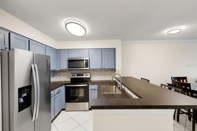 A well presented 2-bedroom, 2-bathroom condo in desirable on Feather Sound Country Club in Florida - for sale on GolfHomes.com, golf home, golf lot