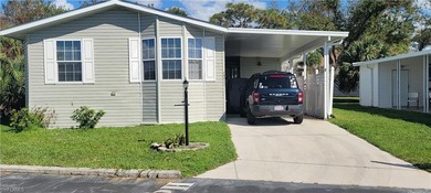This 2008 Jacobson manufactured home is located on one of the on Pelicans Nest Golf Club in Florida - for sale on GolfHomes.com, golf home, golf lot