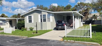 This 2008 Jacobson manufactured home is located on one of the on Pelicans Nest Golf Club in Florida - for sale on GolfHomes.com, golf home, golf lot