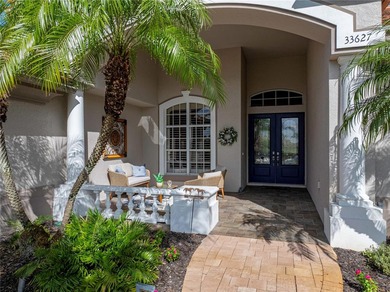 Extraordinary luxury home, located in the exclusive, gated on Lake Jovita Golf and Country Club in Florida - for sale on GolfHomes.com, golf home, golf lot