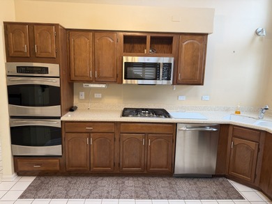 RARE Cypress Point model with 1ST FLOOR MASTER BEDROOM with on Poplar Creek Country Club in Illinois - for sale on GolfHomes.com, golf home, golf lot