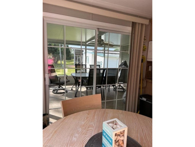 This 2008 Jacobson manufactured home is located on one of the on Pelicans Nest Golf Club in Florida - for sale on GolfHomes.com, golf home, golf lot