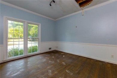 Beautiful spacious fixer upper in the heart of Buckhead.  This on Bobby Jones Golf Club in Georgia - for sale on GolfHomes.com, golf home, golf lot