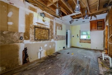Beautiful spacious fixer upper in the heart of Buckhead.  This on Bobby Jones Golf Club in Georgia - for sale on GolfHomes.com, golf home, golf lot