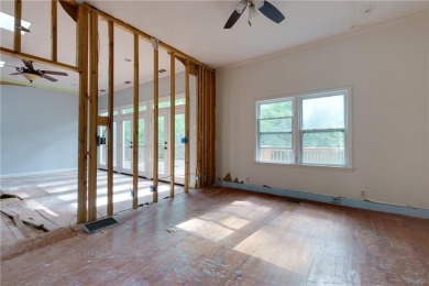 Beautiful spacious fixer upper in the heart of Buckhead.  This on Bobby Jones Golf Club in Georgia - for sale on GolfHomes.com, golf home, golf lot