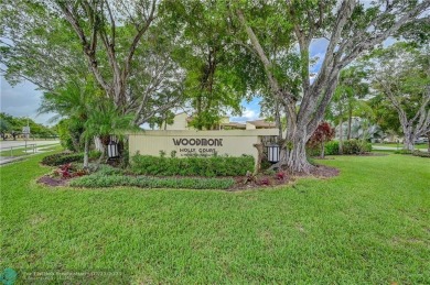 Completely update unit, split floor plan with 2 large master on Woodmont Country Club in Florida - for sale on GolfHomes.com, golf home, golf lot