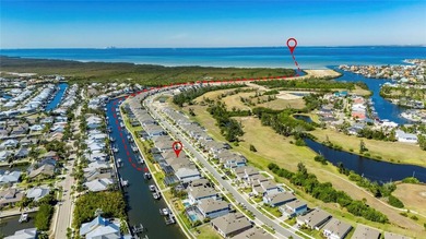 944 Signet Dr, Apollo Beach, FL 33572 | 4 Bedrooms | 3.5 on Apollo Beach Golf and Sea Club in Florida - for sale on GolfHomes.com, golf home, golf lot