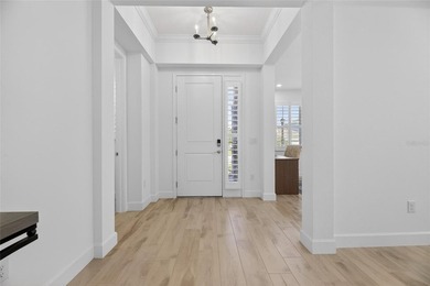 944 Signet Dr, Apollo Beach, FL 33572 | 4 Bedrooms | 3.5 on Apollo Beach Golf and Sea Club in Florida - for sale on GolfHomes.com, golf home, golf lot