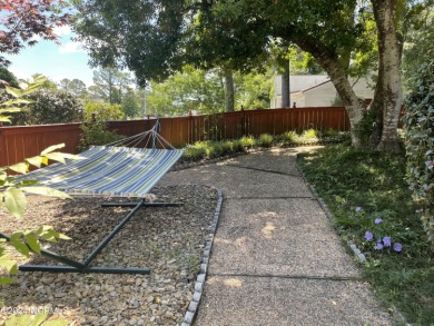 This waterfront resort home offers a lifestyle immersed in on Harbour Point Golf Club in North Carolina - for sale on GolfHomes.com, golf home, golf lot