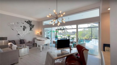 Reminiscent of On Golden Pond, this waterfront sanctuary will on TPC Prestancia in Florida - for sale on GolfHomes.com, golf home, golf lot