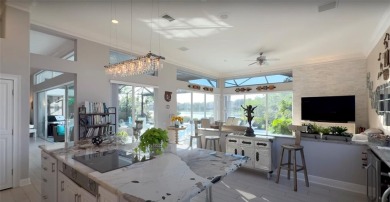 Reminiscent of On Golden Pond, this waterfront sanctuary will on TPC Prestancia in Florida - for sale on GolfHomes.com, golf home, golf lot