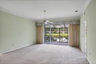 Privacy is delivered in this 2 bedroom, 2 bathroom villa on The Meadows Golf and Country Club in Florida - for sale on GolfHomes.com, golf home, golf lot