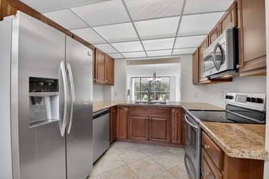 Light and bright 2 bedroom 2 bath condo located on the third on The Country Club At Boca Raton in Florida - for sale on GolfHomes.com, golf home, golf lot