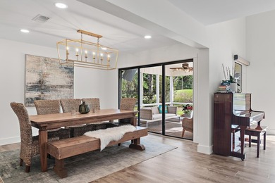 Welcome to 99 Country Club Dr. W, an elegantly updated on Indian Bayou Golf and Country Club in Florida - for sale on GolfHomes.com, golf home, golf lot