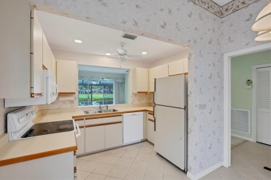 Privacy is delivered in this 2 bedroom, 2 bathroom villa on The Meadows Golf and Country Club in Florida - for sale on GolfHomes.com, golf home, golf lot