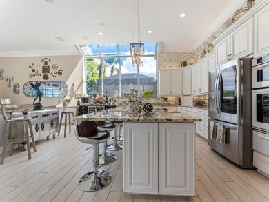 Reminiscent of On Golden Pond, this waterfront sanctuary will on TPC Prestancia in Florida - for sale on GolfHomes.com, golf home, golf lot
