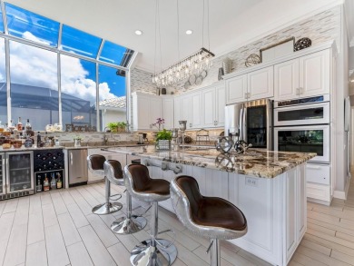 Reminiscent of On Golden Pond, this waterfront sanctuary will on TPC Prestancia in Florida - for sale on GolfHomes.com, golf home, golf lot