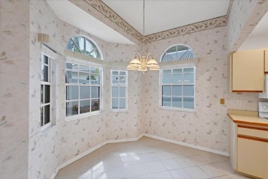 Privacy is delivered in this 2 bedroom, 2 bathroom villa on The Meadows Golf and Country Club in Florida - for sale on GolfHomes.com, golf home, golf lot