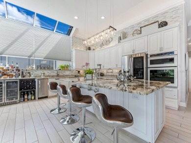 Reminiscent of On Golden Pond, this waterfront sanctuary will on TPC Prestancia in Florida - for sale on GolfHomes.com, golf home, golf lot