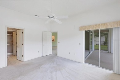 Privacy is delivered in this 2 bedroom, 2 bathroom villa on The Meadows Golf and Country Club in Florida - for sale on GolfHomes.com, golf home, golf lot