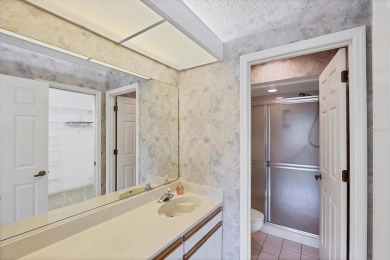 Privacy is delivered in this 2 bedroom, 2 bathroom villa on The Meadows Golf and Country Club in Florida - for sale on GolfHomes.com, golf home, golf lot