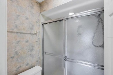 Privacy is delivered in this 2 bedroom, 2 bathroom villa on The Meadows Golf and Country Club in Florida - for sale on GolfHomes.com, golf home, golf lot
